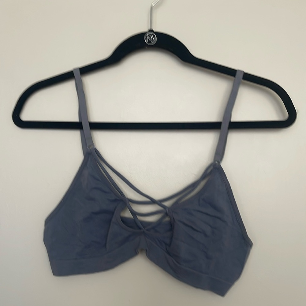 Light blue bra with cross straps on the front
